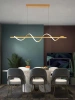 Nowoczesna złota lampa wisząca LED Golden Wave 100 cm