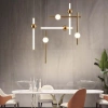 Nowoczesna lampa wisząca Led Solis A2 - mleczna kula i mosiężne wykończenie